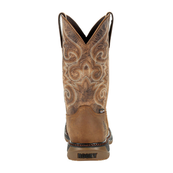back of cowgirl boot with distressed shaft and white and brown embroidery