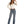 Load image into Gallery viewer, brunette woman wearing medium blue denim jeans, cream long sleeve top, and brown boots, belt, and cowgirl hat