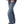 Load image into Gallery viewer, woman wearing blue jeans with leopard print vented hem and black polka dot shirt with thumbs in front pockets