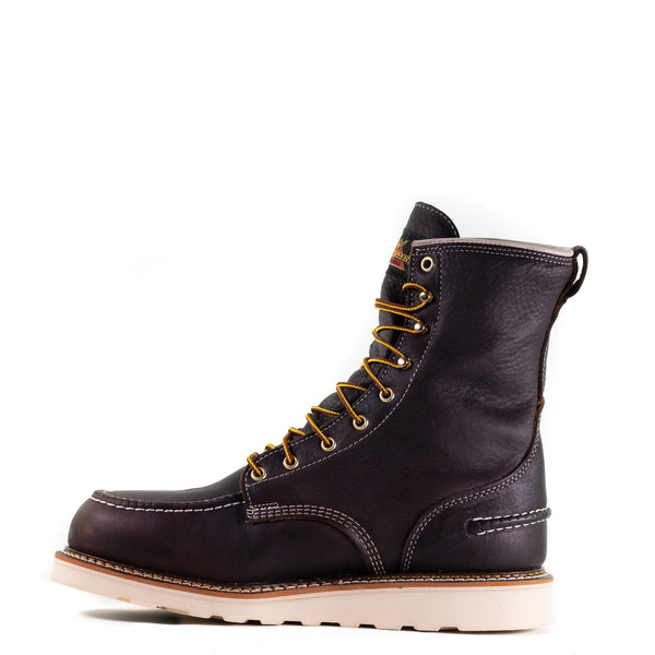 left side view of dark brown high top moccasin style boot with yellow/brown laces and white wedge sole