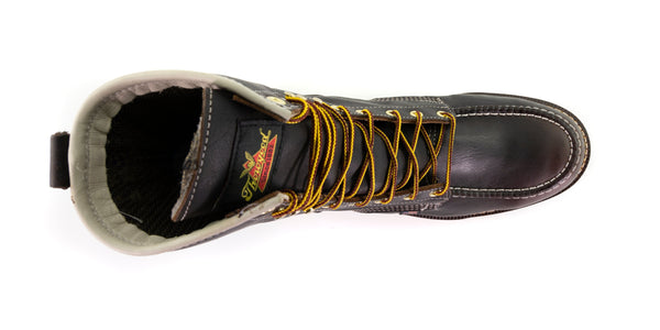 top down view of dark brown high top moccasin style boot with yellow/brown laces and thorogood logo on top of tongue.