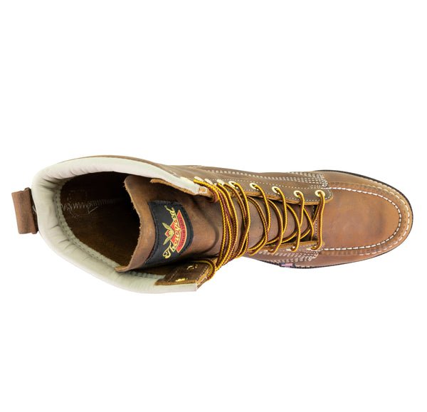 top down view of mens brown logger boot with white interior and stitching and thorogood logo on tongue. yellow/brown laces.