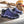 Load image into Gallery viewer, womens athletic purple shoe with hexagon pattern and black accents displayed in a work environment