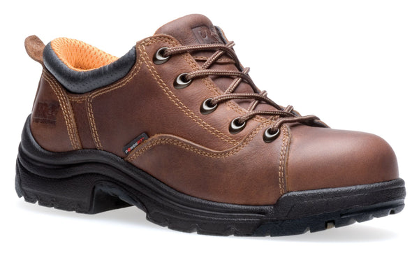 womans brown work boot with black sole and orange interior