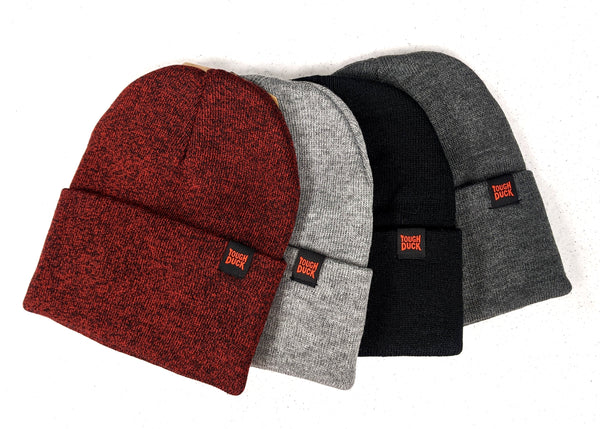four cuffed beanies fanned in assorted colors of red, heather, black, and charcoal