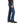 Load image into Gallery viewer, man in brown solid button up and brown belt wearing blue jeans side view