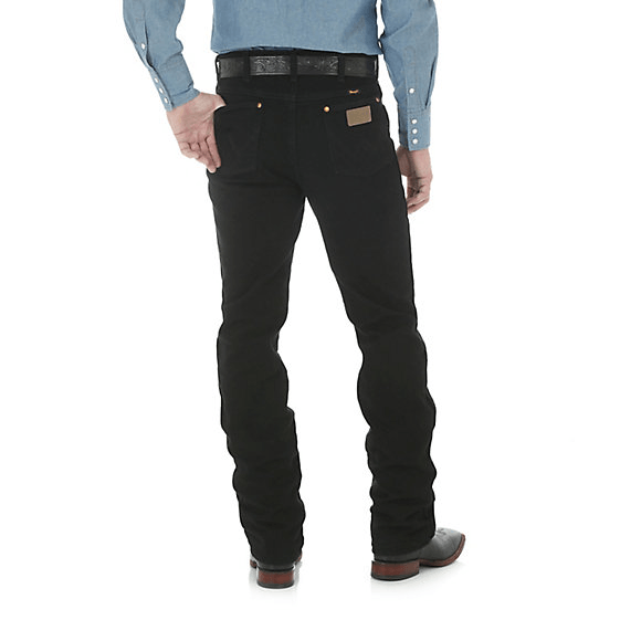man in solid pale blue shirt and black pants back angle