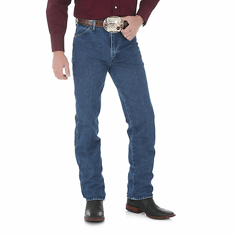 man in maroon shirt with big belt and blue jeans