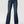 Load image into Gallery viewer, women wearing blue jeans and tan boots with hands in front pockers