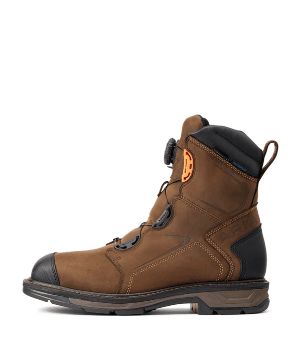 Brown work boot with black sole on a white background