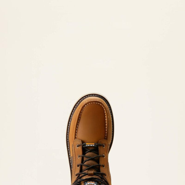 Brown leather boot with black laces on a beige background