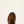 Load image into Gallery viewer, Detailed view of the round toe of a brown work boot with black laces and black toe cap on a white background

