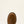 Load image into Gallery viewer, Close-up of a brown work boot rounded toe on a beige background
