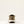 Load image into Gallery viewer, Rear view of a brown shoe with white sole on a light beige background
