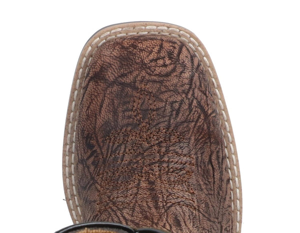 Close up view of square toe of kids cowboy boot with print pattern on vamp.