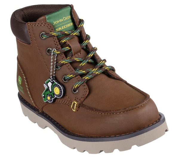 Brown children's boot with green and yellow accents and laces and a John Deere charm on a white background