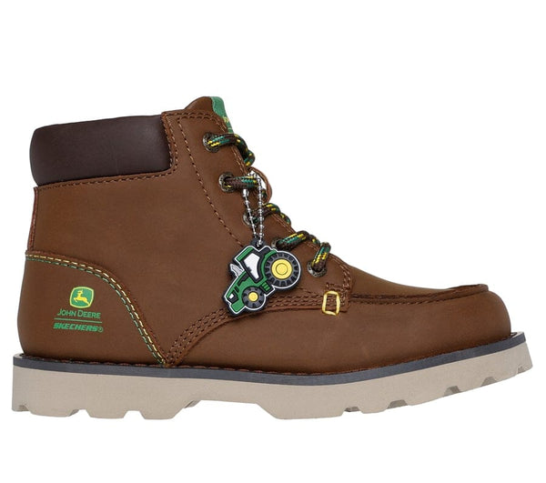 Right side view of brown John Deere kids boot with green and yellow accents, with a tractor charm on a white background