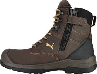 Brown boot with black zipper and gold accents on a white background