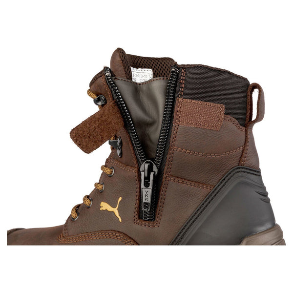 Brown boot with zipper detail on a white background