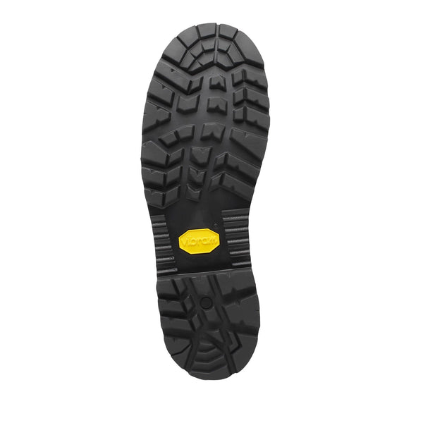 Black sole of a work shoe with a yellow label on a white background