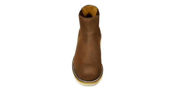 Brown leather boot on a white background