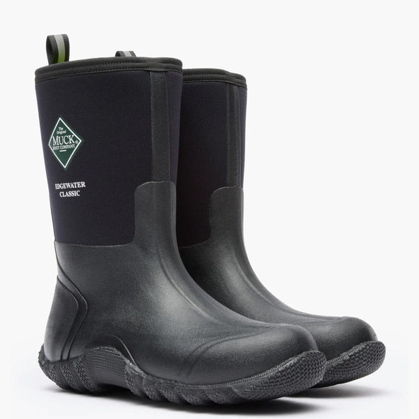 Pair of black Muck rubber boots on a white background