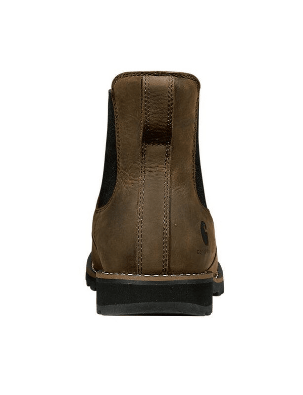 Rear heel view of a dark brown leather chelsea boot with leather pull strap and a rubber outsole.