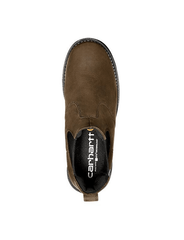 Top view of a dark brown leather chelsea boot with round toe, elastic gore, and a rubber outsole. 