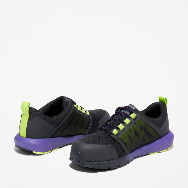 Black and purple lace-up sneakers with green accents on a white background