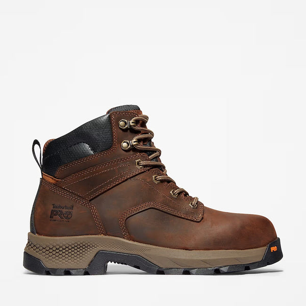 Brown leather boot with laces and sole on a white background