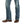 Load image into Gallery viewer, close up view of distressed denim medium wash jean pant legs and brown boots

