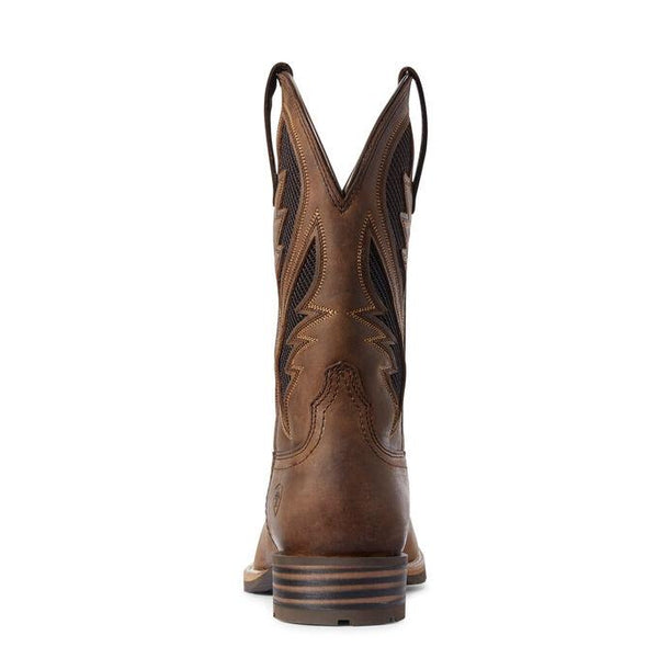 rear view of light brown square-toed cowboy boot