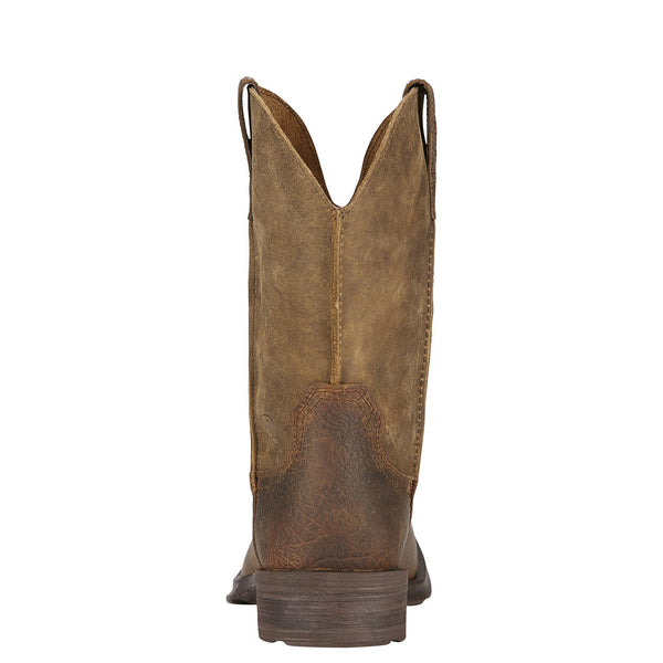 back view of cowboy boot with a distressed light brown shaft and a darker brown vamp