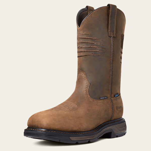 left front angled view of brown distressed western work boot with a rugged American flag embroidered across the shaft