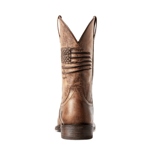 back view of Brown distressed cowboy boot with a rugged American flag embroidered across the shaft