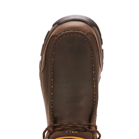 Top view of a brown work boot with yellow lining inside