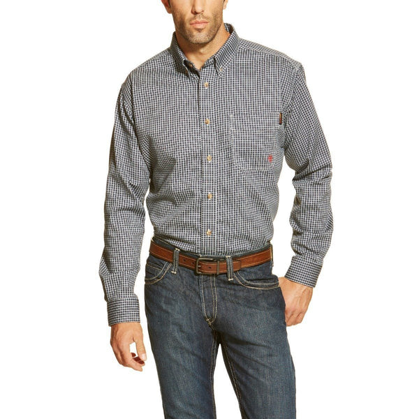 man wearing a blue plaid button down and blue jeans