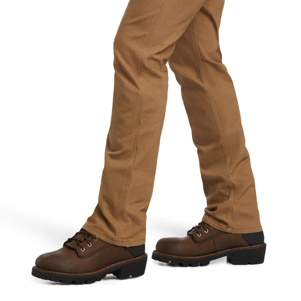 lower leg view of man wearing khaki work pants with brown boots