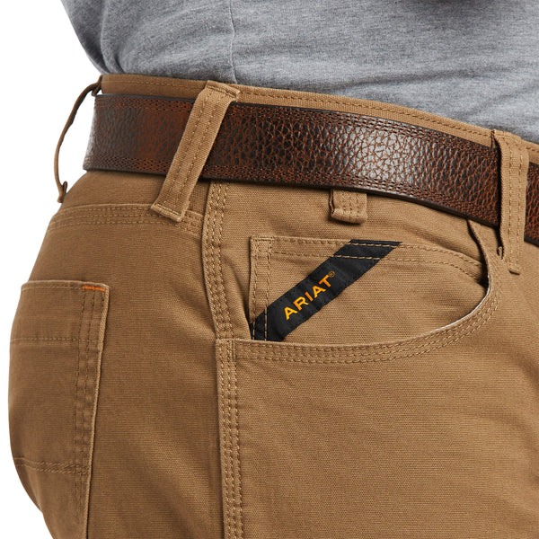 front pocket view of man wearing khaki work pants with brown belt and boots