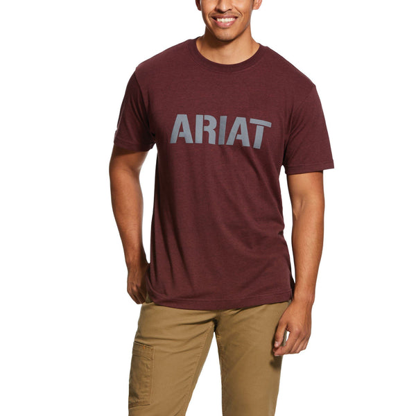 man wearing a maroon t-shirt with Ariat written across the chest in stencil