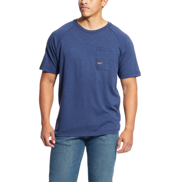 man wearing a blue pocket t-shirt and blue jeans