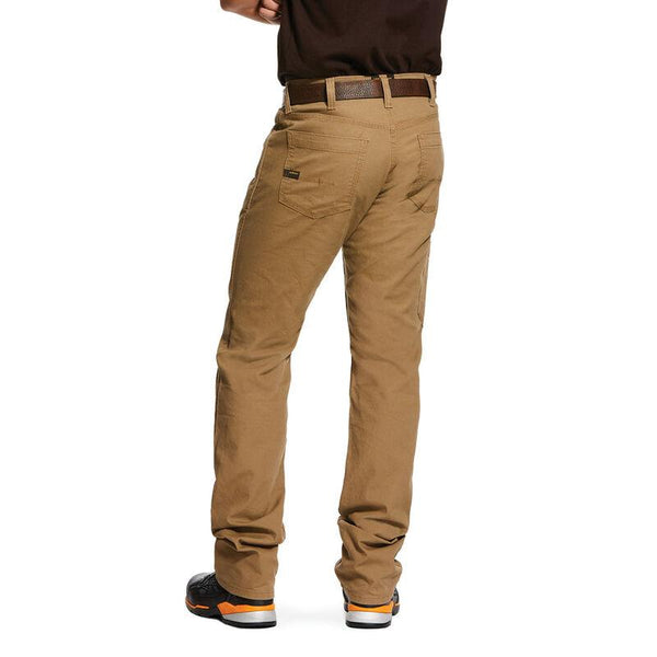 back view of man wearing khaki pants and black and orange work shoes
