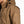 Load image into Gallery viewer, shoulder view of man wearing a brown insulated coat 
