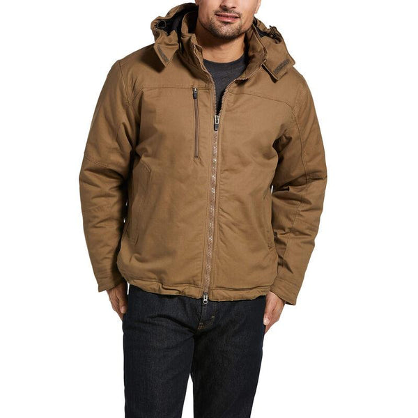 man wearing a brown insulated coat and dark jeans