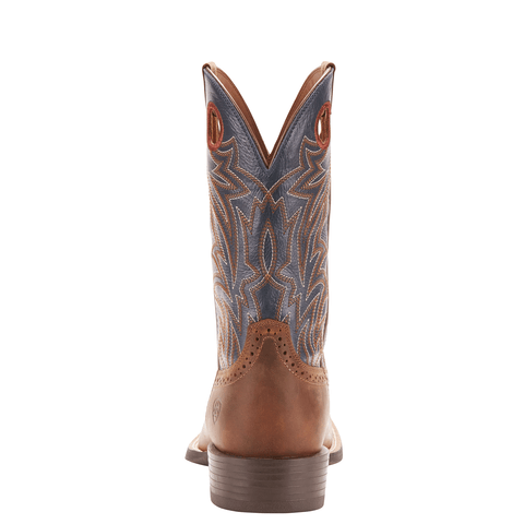 back view of cowboy boot with a blue shaft with brown and white embroidery and light brown vamp