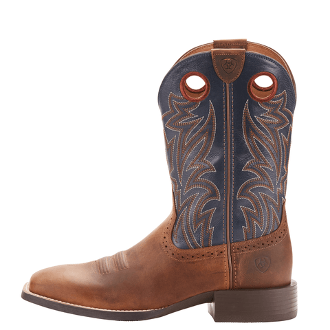 side view of cowboy boot with a blue shaft with brown and white embroidery and light brown vamp