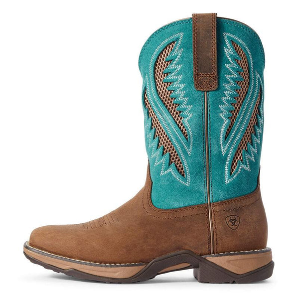 side view of cowboy boot with turquoise shaft and net inlays with white embroidery and a brown vamp 