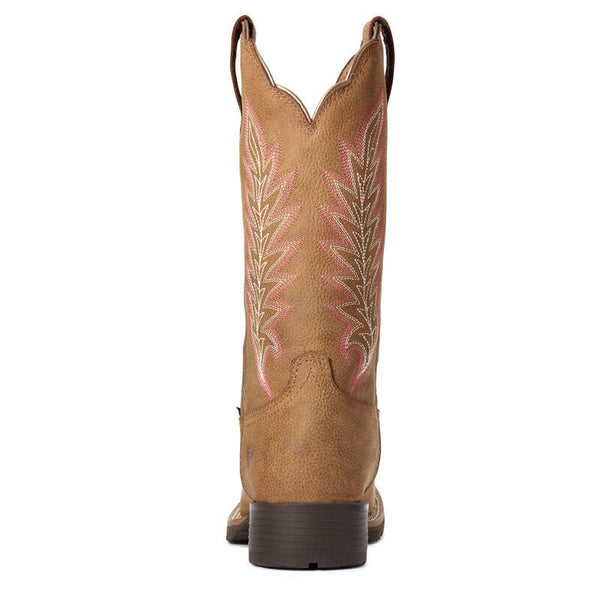 back view of Brown cowgirl boot with a pink and white feather embroidery 