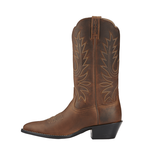 side view of brown cowgirl boot with light brown embroidery 