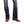 Load image into Gallery viewer, close up view of dark blue boot cut denim jeans with white stitching and medium brown square toe western boots
